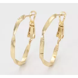 Gold-Creolen in Wellenform